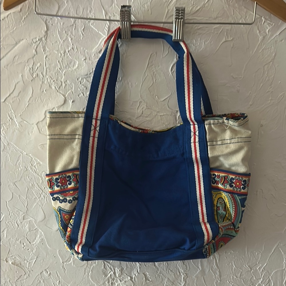 Vera Bradley 
Blue and Cream Tote Bag
Approx. 9” x 13”
Short Handles
